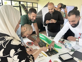 Gamified negotiation challenge with teams trading resources
